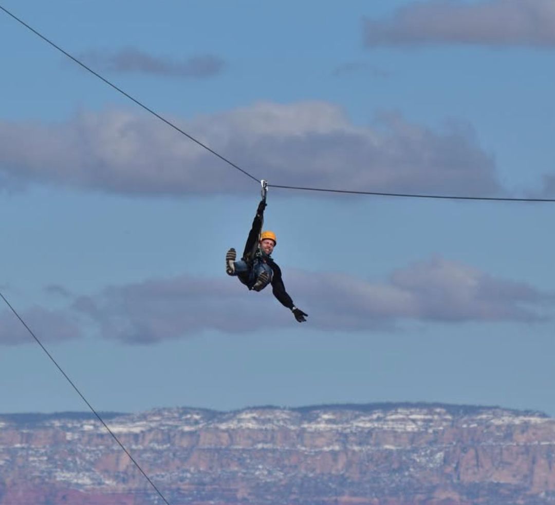 A rider flying over the wildlife park