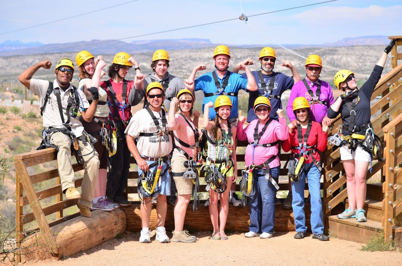 A group of riders in harnesses with their guides
